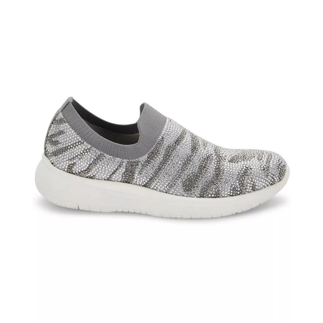 Gray slip-on sneaker with patterned sole on a white background