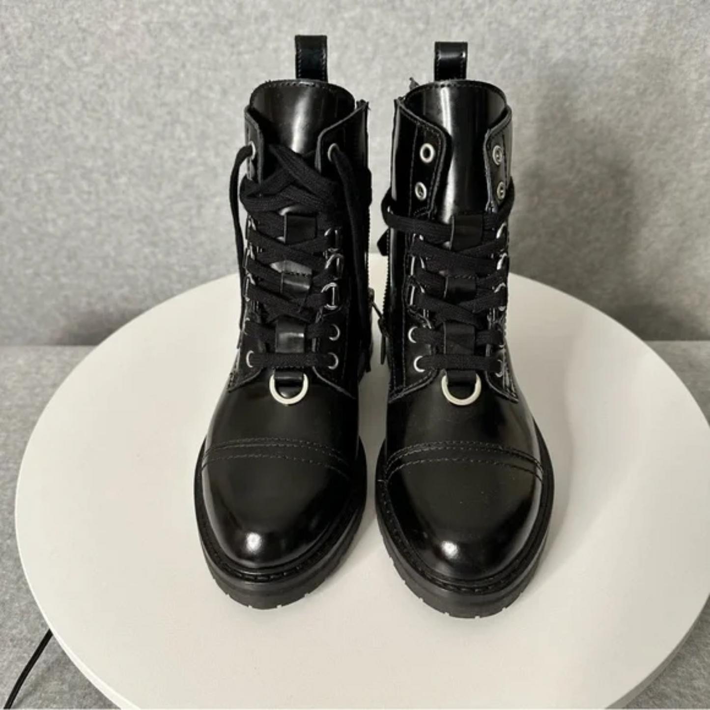 Front view of boots neutral background
