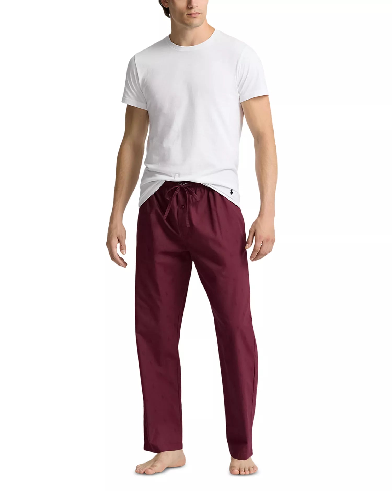 Polo Ralph Lauren men's wine pajama pants featuring an allover blue pony print, modeled with a white t-shirt on a white background.