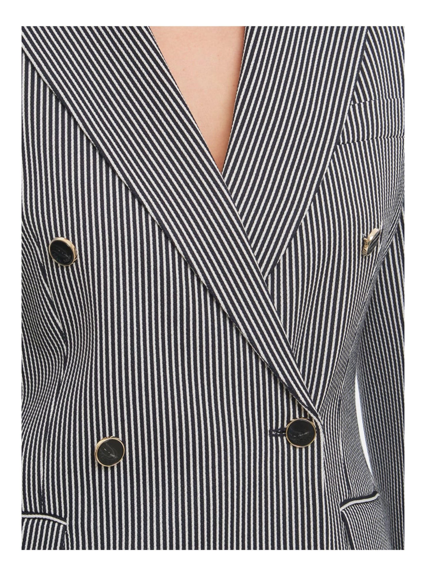 Black and white striped blazer with gold trim buttons, marble swirl design on button inscribed Max Mara  on a plain background