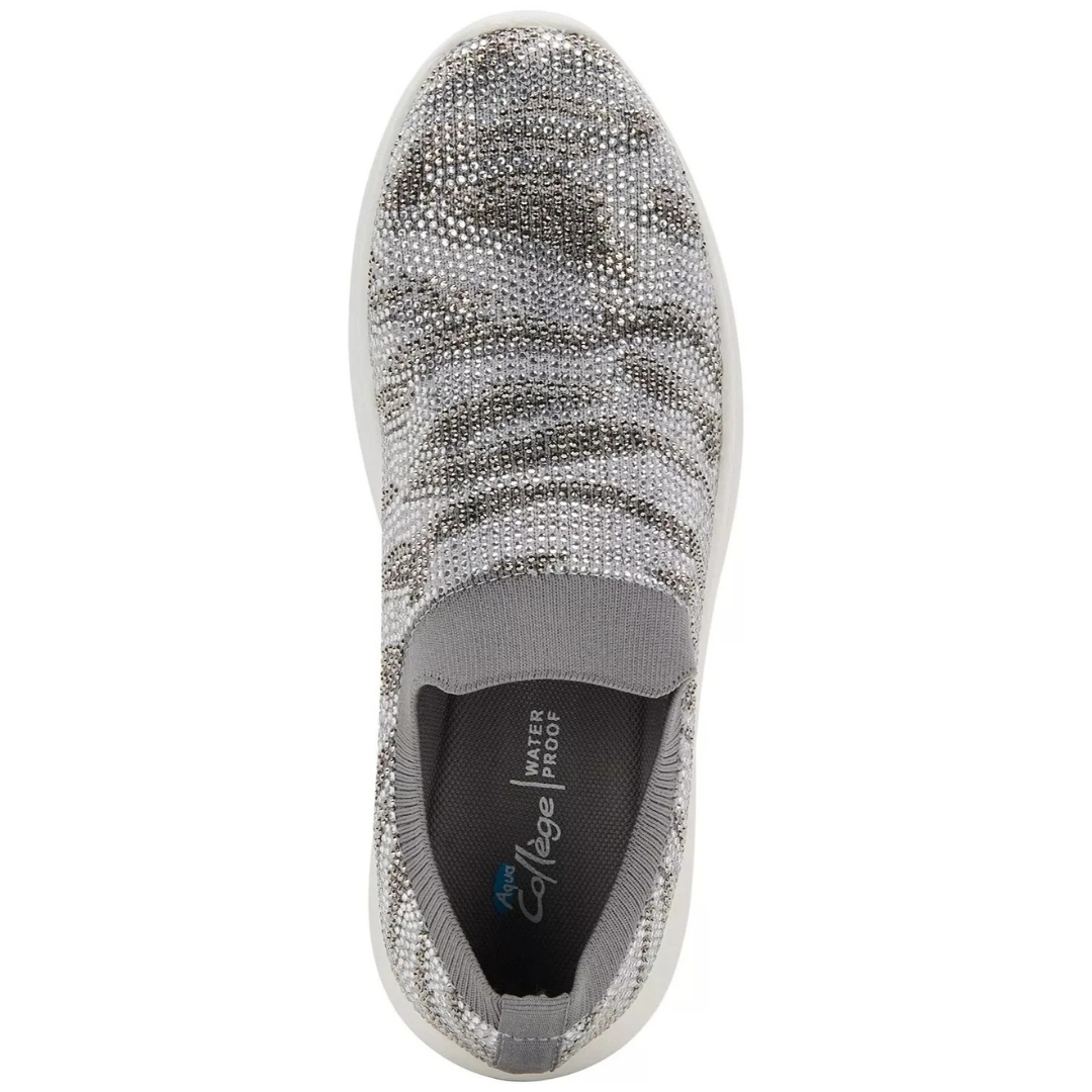 Gray slip-on shoe with rhinestone embellishments on a white background
