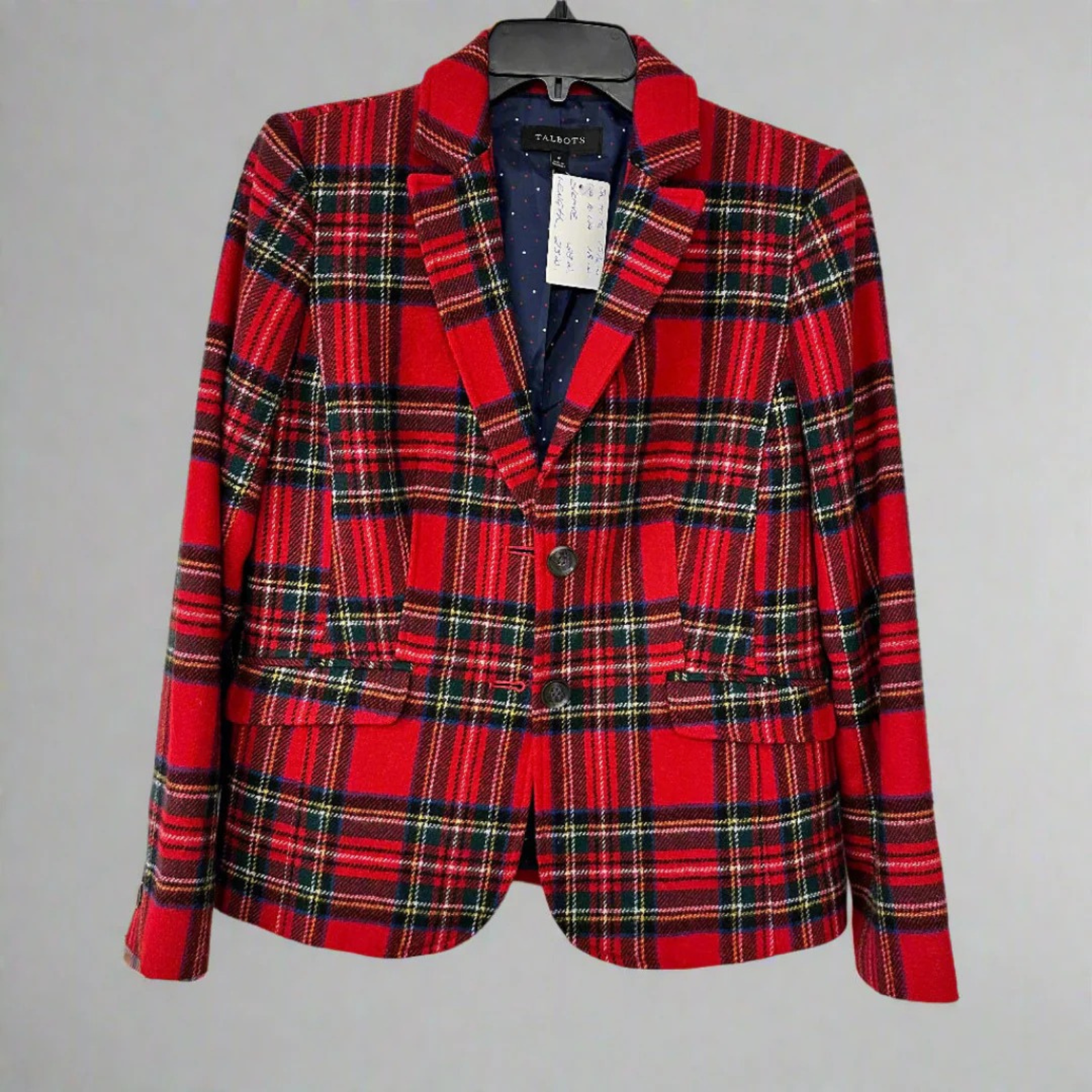 Plaid blazer on a gray background